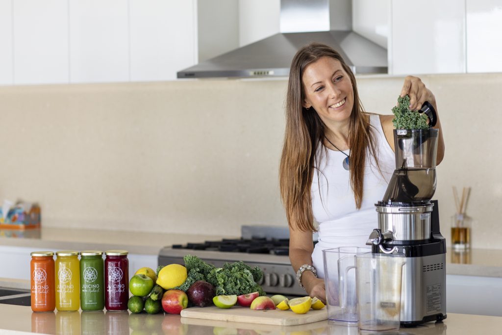 Nadia K Juicing Kale in a Juicer